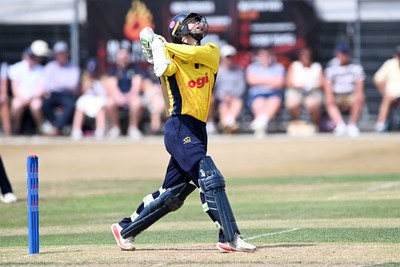 240726 - Glamorgan v Yorkshire - Metro Bank One Day Cup Men - Eddie Byrom of Glamorgan hits a ball high and it is caught by Dom Bess of Yorkshire