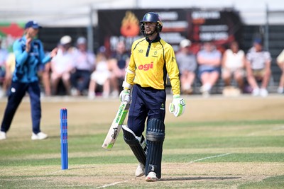 240726 - Glamorgan v Yorkshire - Metro Bank One Day Cup Men - Eddie Byrom of Glamorgan hits a ball high and it is caught by Dom Bess of Yorkshire