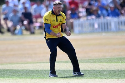 240726 - Glamorgan v Yorkshire - Metro Bank One Day Cup Men - Dan Douthwaite of Glamorgan bowls the ball to dismiss Will Bennison of Yorkshire