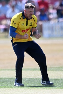 240726 - Glamorgan v Yorkshire - Metro Bank One Day Cup Men - Dan Douthwaite of Glamorgan bowls the ball to dismiss Will Bennison of Yorkshire