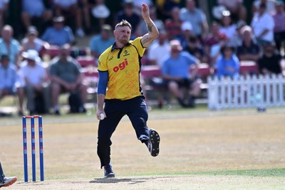 240726 - Glamorgan v Yorkshire - Metro Bank One Day Cup Men - Dan Douthwaite of Glamorgan bowling