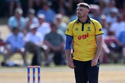 240726 - Glamorgan v Yorkshire - Metro Bank One Day Cup Men - Dan Douthwaite of Glamorgan bowling