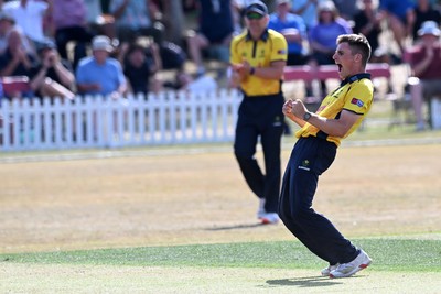 240726 - Glamorgan v Yorkshire - Metro Bank One Day Cup Men - Andy Gorvin of Glamorgan celebrates after he bowls the ball to dismiss Dom Bess of Yorkshire