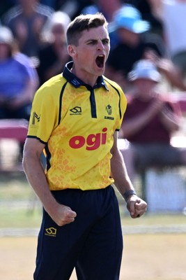 240726 - Glamorgan v Yorkshire - Metro Bank One Day Cup Men - Andy Gorvin of Glamorgan celebrates after he bowls the ball to dismiss Dom Bess of Yorkshire