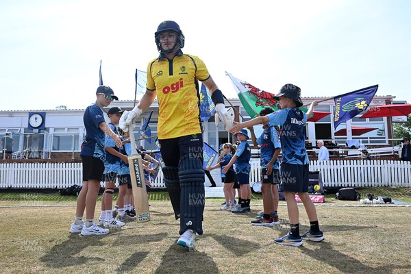 240726 - Glamorgan v Yorkshire - Metro Bank One Day Cup Men - Callum Nicholls of Glamorgan runs out at the start of the match