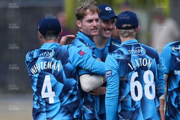 240726 - Glamorgan v Yorkshire - Metro Bank One Day Cup Men - Ben Cliff of Yorkshire celebrates with team mates after Will Smale of Glamorgan is LBW
