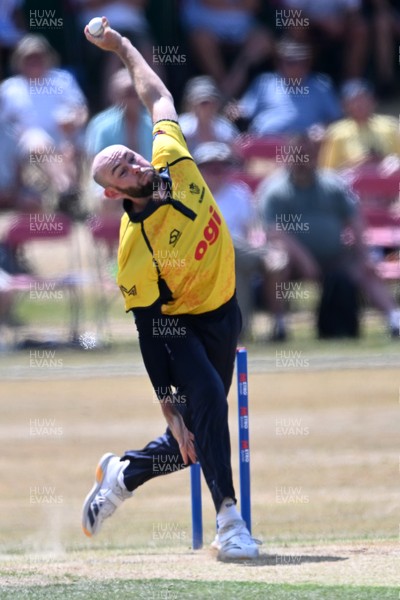 240726 - Glamorgan v Yorkshire - Metro Bank One Day Cup Men - Jamie Mcilroy of Glamorgan bowling