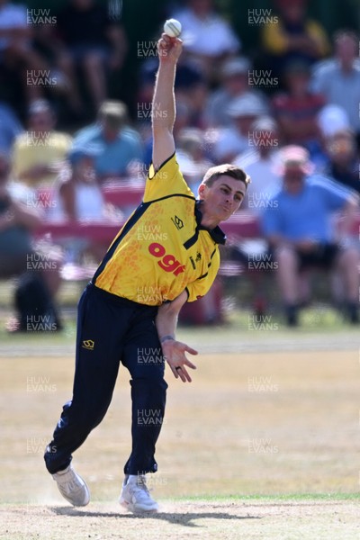 240726 - Glamorgan v Yorkshire - Metro Bank One Day Cup Men - Andy Gorvin of Glamorgan bowls the ball to dismiss George Hill of Yorkshire