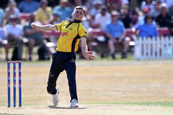 240726 - Glamorgan v Yorkshire - Metro Bank One Day Cup Men - Andy Gorvin of Glamorgan bowls the ball to dismiss George Hill of Yorkshire