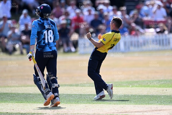 240726 - Glamorgan v Yorkshire - Metro Bank One Day Cup Men - Andy Gorvin of Glamorgan bowls the ball to dismiss George Hill of Yorkshire