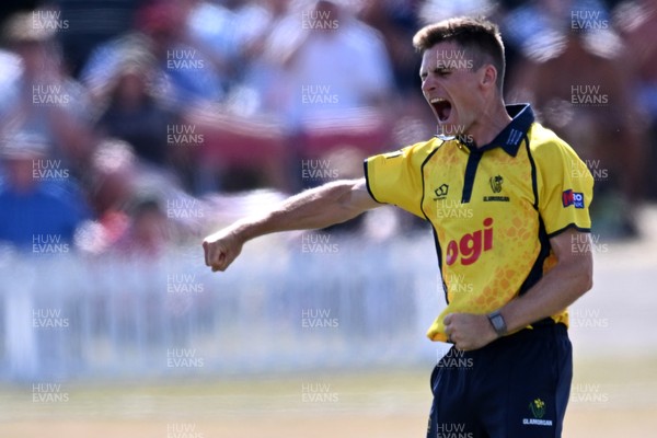 240726 - Glamorgan v Yorkshire - Metro Bank One Day Cup Men - Andy Gorvin of Glamorgan bowls the ball to dismiss George Hill of Yorkshire