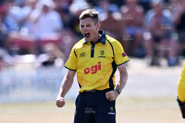 240726 - Glamorgan v Yorkshire - Metro Bank One Day Cup Men - Andy Gorvin of Glamorgan bowls the ball to dismiss George Hill of Yorkshire