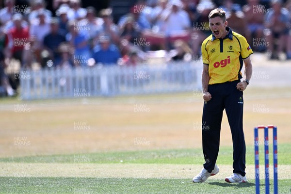 240726 - Glamorgan v Yorkshire - Metro Bank One Day Cup Men - Andy Gorvin of Glamorgan bowls the ball to dismiss George Hill of Yorkshire