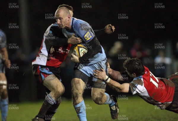 18.11.08 ... Glamorgan Wanderers v Cardiff Blues, Friendly Match. - Blues Gareth Thomas is tackled by Wanderers James Thomas and Nick Gill 