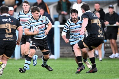040926 - Glamorgan Wanderers v Mountain Ash - Championship East - Ashley Bissett of Glamorgan is challenged by Steffan Calderbank of Mountain Ash