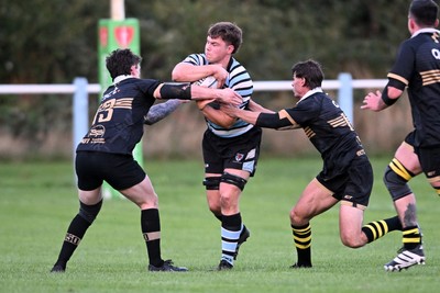 040926 - Glamorgan Wanderers v Mountain Ash - Championship East - Ashley Bissett of Glamorgan is challenged by Jamie Long of Mountain Ash