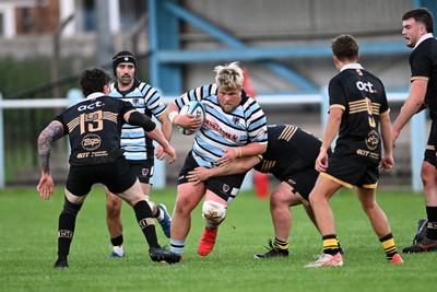 040926 - Glamorgan Wanderers v Mountain Ash - Championship East - Mike Vaughan of Glamorgan is challenged by Jamie Long of Mountain Ash