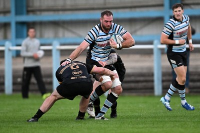 040926 - Glamorgan Wanderers v Mountain Ash - Championship East - Shaun O'Rourke of Glamorgan is challenged by Kieran Coomer of Mountain Ash