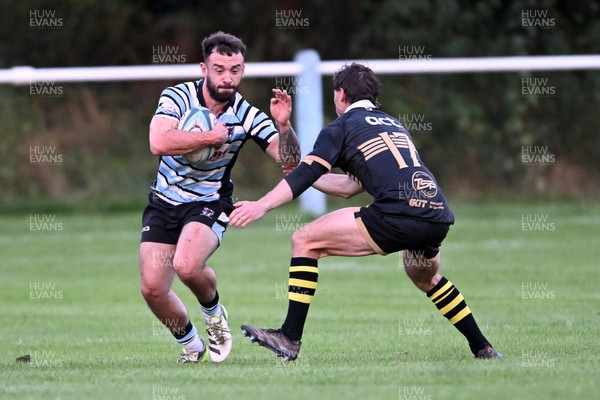 040926 - Glamorgan Wanderers v Mountain Ash - Championship East - Reagan Moore of Glamorgan is challenged by Nathan Evans of Mountain Ash