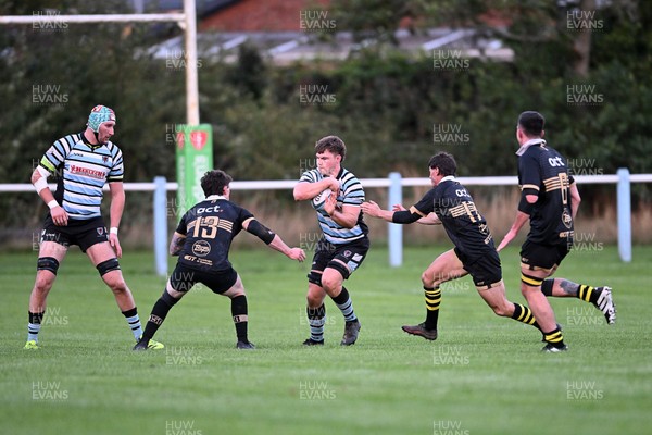 040926 - Glamorgan Wanderers v Mountain Ash - Championship East - Ashley Bissett of Glamorgan is challenged by Jamie Long of Mountain Ash