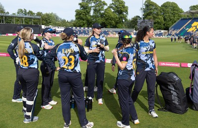 230526 - Glamorgan Women v Derbyshire Falcons Women, Vitality Blast Women League 2 - Glamorgan huddle up after beating Derbyshire Falcons Women
