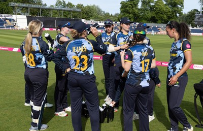 230526 - Glamorgan Women v Derbyshire Falcons Women, Vitality Blast Women League 2 - Glamorgan huddle up after beating Derbyshire Falcons Women