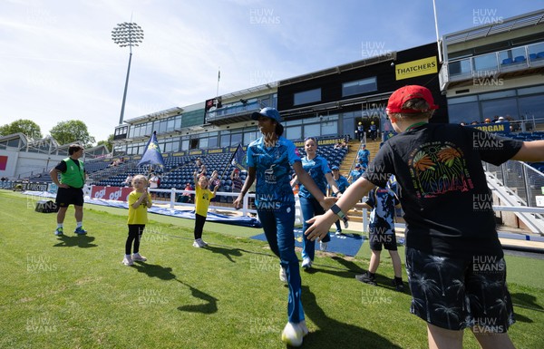230526 - Glamorgan Women v Derbyshire Falcons Women, Vitality Blast Women League 2 - Derbyshire Falcons make their way out at the start of the match