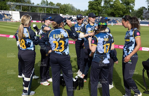 230526 - Glamorgan Women v Derbyshire Falcons Women, Vitality Blast Women League 2 - Glamorgan huddle up after beating Derbyshire Falcons Women