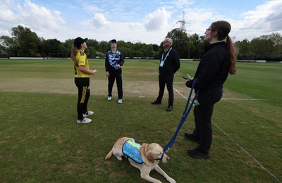 050525 - Glamorgan Women v Gloucestershire Women, Vitality T20 Women’s County Cup - Lauren Parfitt of Glamorgan Women and Emily Geach of Gloucestershire join the umpires for the coin toss
