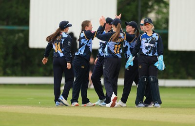 050525 - Glamorgan Women v Gloucestershire Women, Vitality T20 Women’s County Cup - Glamorgan celebrate taking the wicket go Prarthana Reddy of Gloucestershire