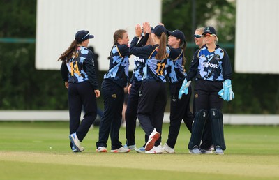 050525 - Glamorgan Women v Gloucestershire Women, Vitality T20 Women’s County Cup - Glamorgan celebrate taking the wicket go Prarthana Reddy of Gloucestershire
