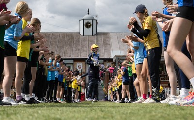 050525 - Glamorgan Women v Gloucestershire Women, Vitality T20 Women’s County Cup - Guard of hopnour welcome Glamorgan to the field