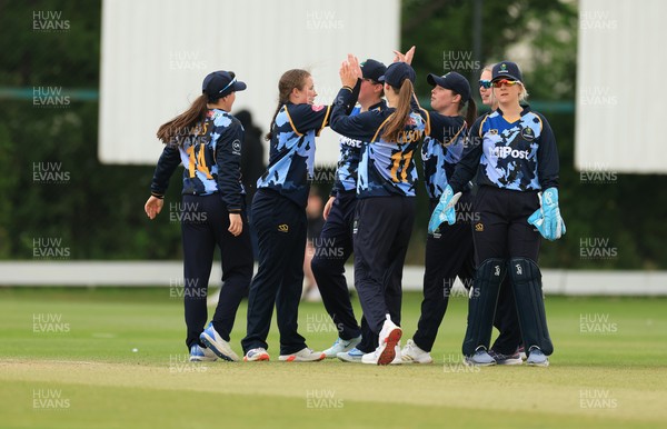 050525 - Glamorgan Women v Gloucestershire Women, Vitality T20 Women’s County Cup - Glamorgan celebrate taking the wicket go Prarthana Reddy of Gloucestershire