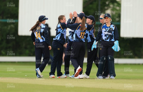 050525 - Glamorgan Women v Gloucestershire Women, Vitality T20 Women’s County Cup - Glamorgan celebrate taking the wicket go Prarthana Reddy of Gloucestershire