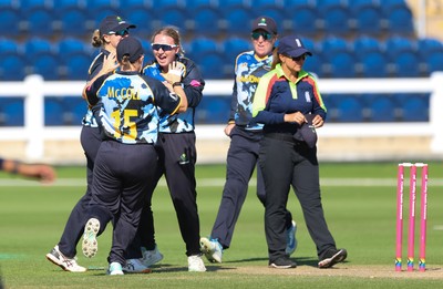 120726 - Glamorgan Women v Gloucestershire Women, Vitality Blast Women League 2 Final - Gemma Porter of Glamorgan Women celebrates with team mates after bowling Amelie Munday of Gloucestershire Women with the first ball of the innings