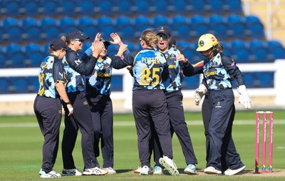 120726 - Glamorgan Women v Gloucestershire Women, Vitality Blast Women League 2 Final - Gemma Porter of Glamorgan Women celebrates with team mates after bowling Amelie Munday of Gloucestershire Women with the first ball of the innings