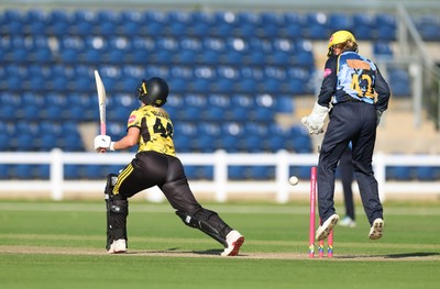 120726 - Glamorgan Women v Gloucestershire Women, Vitality Blast Women League 2 Final - Caitlin Belcher of Gloucestershire Women is bowled by Nicole Reid of Glamorgan Women