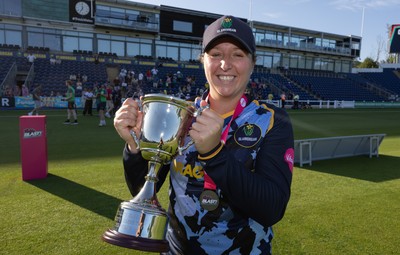 120726 - Glamorgan Women v Gloucestershire Women, Vitality Blast Women League 2 Final - Lauren Parfitt of Glamorgan Women celebrates after being presented with the trophy