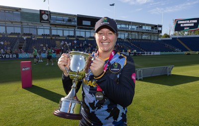 120726 - Glamorgan Women v Gloucestershire Women, Vitality Blast Women League 2 Final - Lauren Parfitt of Glamorgan Women celebrates after being presented with the trophy