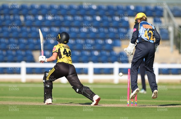120726 - Glamorgan Women v Gloucestershire Women, Vitality Blast Women League 2 Final - Caitlin Belcher of Gloucestershire Women is bowled by Nicole Reid of Glamorgan Women