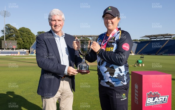 120726 - Glamorgan Women v Gloucestershire Women, Vitality Blast Women League 2 Final - Lauren Parfitt of Glamorgan Women is  presented with the trophy by Alan Wilkins, President of Glamorgan Cricket Club