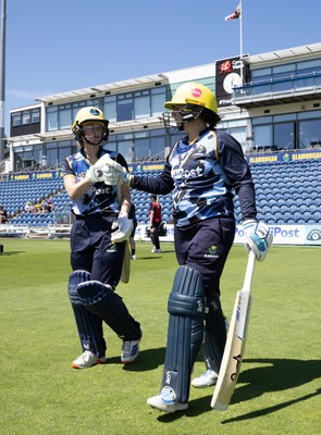 130725 -  Glamorgan Women v Gloucestershire Women, Vitality Blast Women League 2, South Group - Opening batters Bethan Ellis of Glamorgan Women and Lauren Parfitt of Glamorgan Women make their way to the wicket
