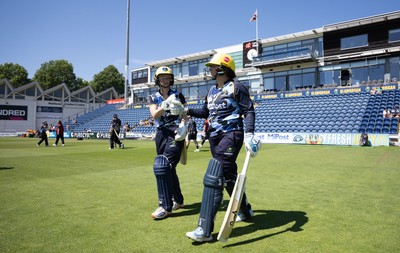 130725 -  Glamorgan Women v Gloucestershire Women, Vitality Blast Women League 2, South Group - Opening batters Bethan Ellis of Glamorgan Women and Lauren Parfitt of Glamorgan Women make their way to the wicket