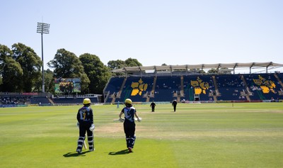 130725 -  Glamorgan Women v Gloucestershire Women, Vitality Blast Women League 2, South Group - Opening batters Bethan Ellis of Glamorgan Women and Lauren Parfitt of Glamorgan Women make their way to the wicket