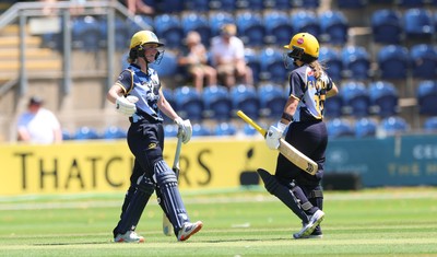 130725 -  Glamorgan Women v Gloucestershire Women, Vitality Blast Women League 2, South Group - Bethan Ellis of Glamorgan Women celebrates her 50 with Beth Gammon of Glamorgan Women