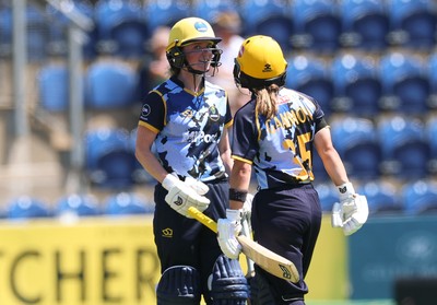 130725 -  Glamorgan Women v Gloucestershire Women, Vitality Blast Women League 2, South Group - Bethan Ellis of Glamorgan Women celebrates her 50 with Beth Gammon of Glamorgan Women