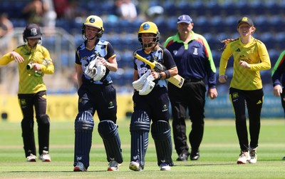130725 -  Glamorgan Women v Gloucestershire Women, Vitality Blast Women League 2, South Group - Bethan Ellis of Glamorgan Women and Beth Gammon of Glamorgan Women leave the field after their partnership wins the match