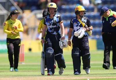 130725 -  Glamorgan Women v Gloucestershire Women, Vitality Blast Women League 2, South Group - Bethan Ellis of Glamorgan Women and Beth Gammon of Glamorgan Women leave the field after their partnership wins the match