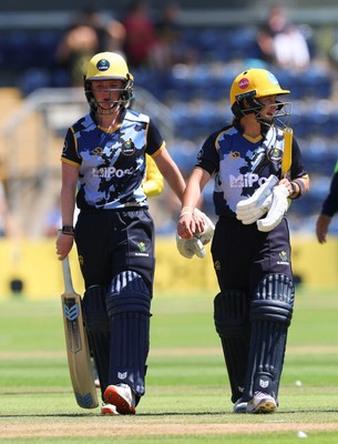 130725 -  Glamorgan Women v Gloucestershire Women, Vitality Blast Women League 2, South Group - Bethan Ellis of Glamorgan Women and Beth Gammon of Glamorgan Women leave the field after their partnership wins the match