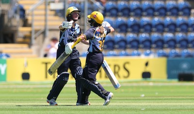 130725 -  Glamorgan Women v Gloucestershire Women, Vitality Blast Women League 2, South Group - Bethan Ellis of Glamorgan Women celebrates with Beth Gammon of Glamorgan Women as their partnership wins the match